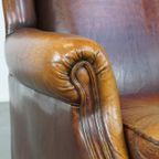 Karakteristieke En Tijdloze Vintage Schapenleren Oorfauteuil Met Mooie Kleuren thumbnail 11
