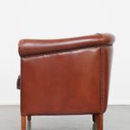 Stijlvolle En Elegante Clubfauteuil Gemaakt Van Rundleer Met Een Luxe Afwerking Met Siernagels thumbnail 11