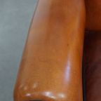 Sierlijke En Ruime Schapenleren Oorfauteuil Met Warme Kleuren thumbnail 6